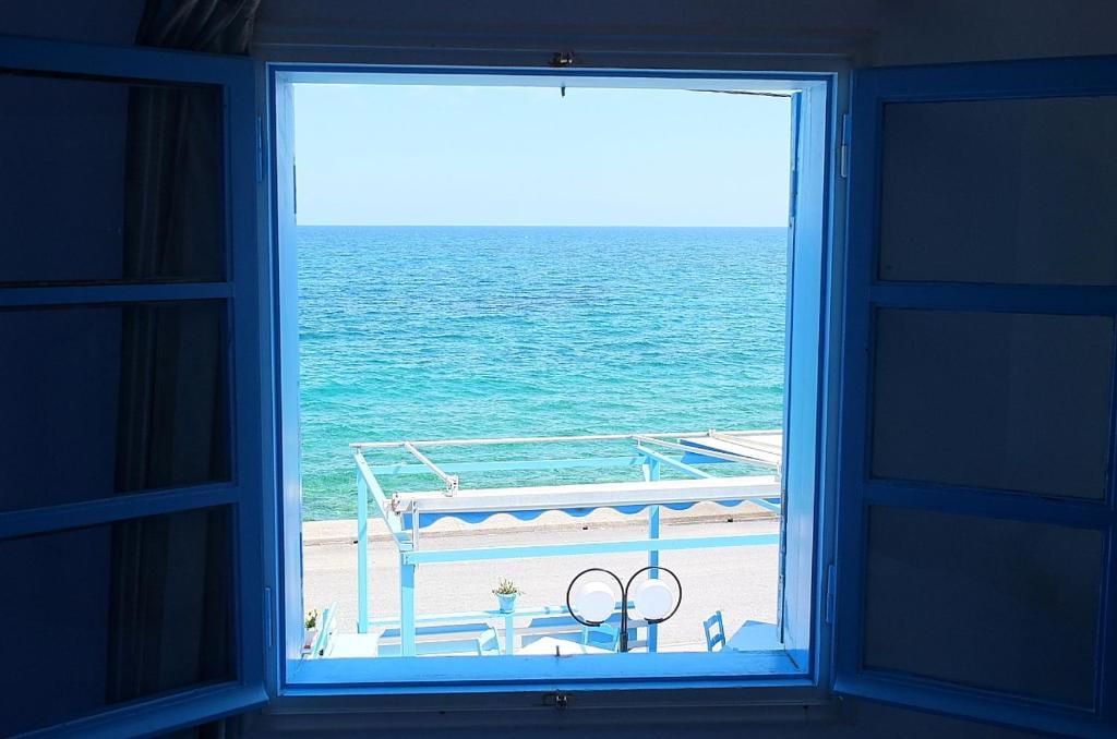 Socrates Apartmens & Restaurant Mílatos Quarto foto